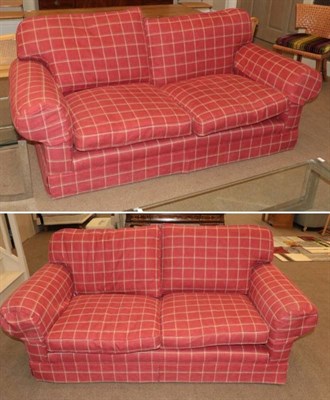 Lot 573 - A Pair of Two-Seater Feather Filled Sofas, late 20th century, recovered in red checked fabric, with