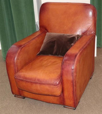 Lot 578 - A 1930s Style Club Armchair, Modern, retailed by John Lewis, covered in brown leather, with rounded