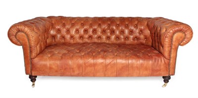 Lot 568 - The Sofa Company Brown Buttoned Leather Chesterfield Sofa, dated 13/06/10, with rounded and...