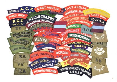Lot 18 - A Collection of Seventy Embroidered Cloth Shoulder Titles, including slip-on battledress examples