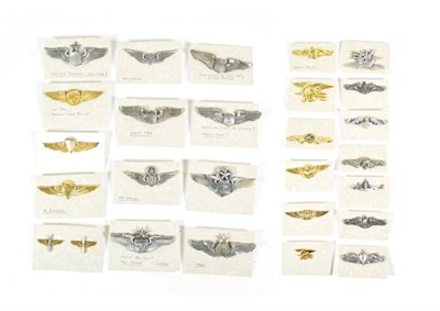 Lot 28 - Twelve US Navy Breast Badges, to a Submarine officer, marked H24N; four Submarine enlisted men, one