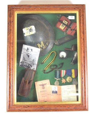 Lot 33 - A Display of Second World War Related Items, including a Brodie helmet to the Military Police,...