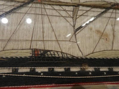 Lot 64 - A 19th Century Sailor's Wool Sampler, worked in long stitch with a three masted gun ship, in a...