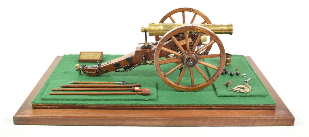 Lot 66 - A Non-working Model of a Napoleonic Field Gun, with 20cm brass barrel, teak carriage, spoked wheels