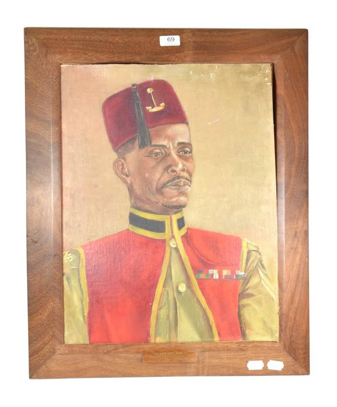 Lot 69 - A Portrait of Corporal Dan Ladi Zaria, The Queen's Own Nigeria Regiment,1957, standing half length
