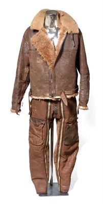 Lot 83 - A Second World War RAF Irvin Sheepskin Flying Jacket and Trousers, the jacket of four panel...