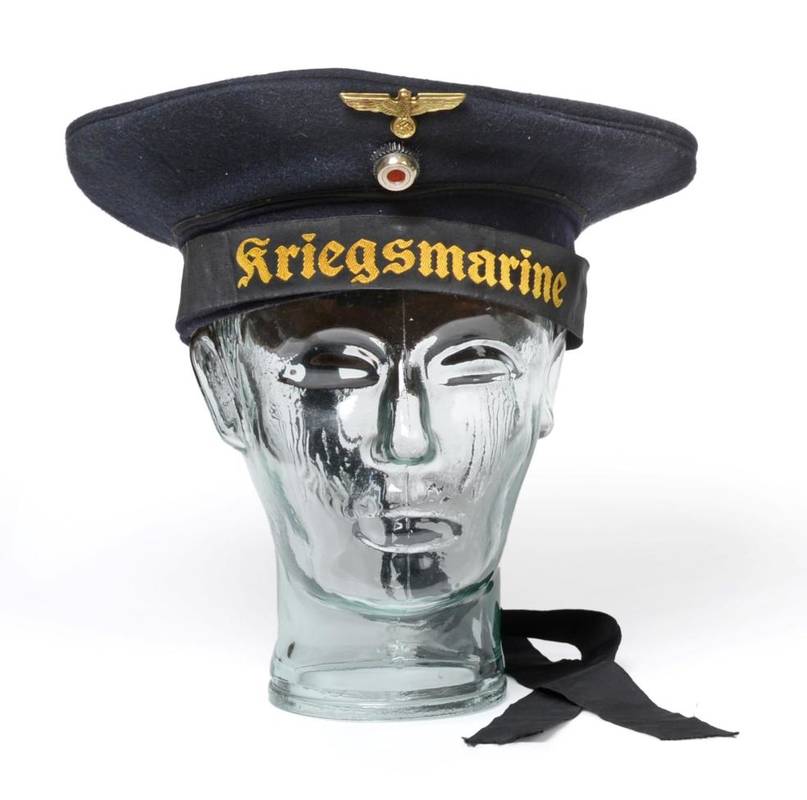 Lot 103 - A German Third Reich Kriegsmarine 'Donald Duck' Hat, in dark navy/black wool, with one piece...
