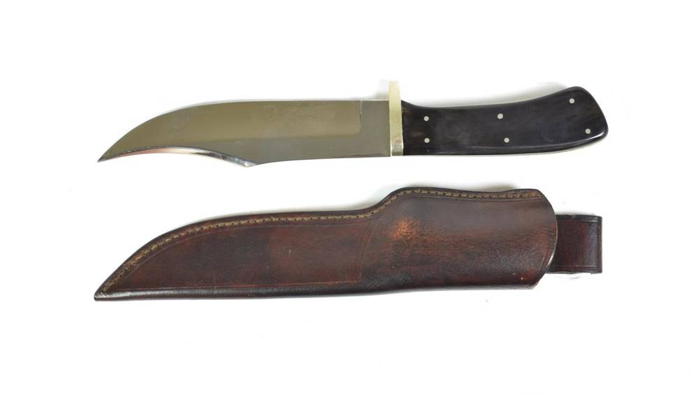 Lot 138 - A Modern Bowie Knife by David North, Sheffield, the 16.5cm clip-point steel blade stamped with...