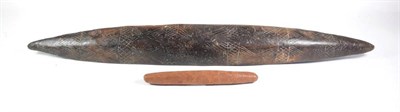 Lot 170 - A Late 19th/Early 20th Century Aborigine Wood Parrying Shield, of rounded elongated elliptical...
