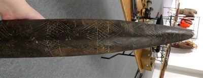 Lot 170 - A Late 19th/Early 20th Century Aborigine Wood Parrying Shield, of rounded elongated elliptical...