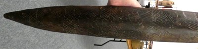 Lot 170 - A Late 19th/Early 20th Century Aborigine Wood Parrying Shield, of rounded elongated elliptical...