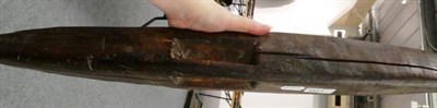 Lot 170 - A Late 19th/Early 20th Century Aborigine Wood Parrying Shield, of rounded elongated elliptical...