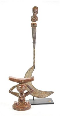 Lot 176 - A Fang Ceremonial Sickle, with crescent shape blade, wrythen fluted socket head secured by a...