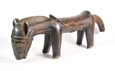 Lot 178 - A Senufo Chief's Ceremonial Stool, West Africa, carved from one piece of wood as a horse...