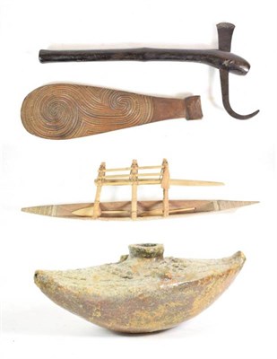 Lot 184 - A Fijian Pottery Water Vessel, of canoe shape, glazed with makadre gum from the Dakua Pine, 24cm; a