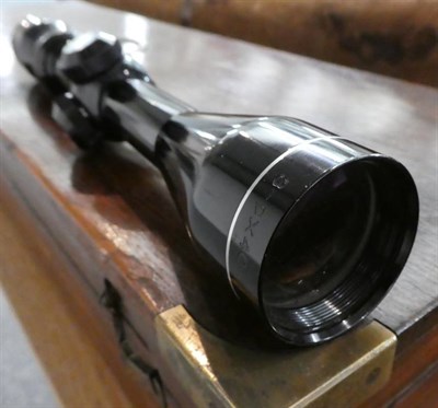 Lot 194 - A Yukon Optics Night Vision Riflescope, with manual and fitting bar, original box, together...