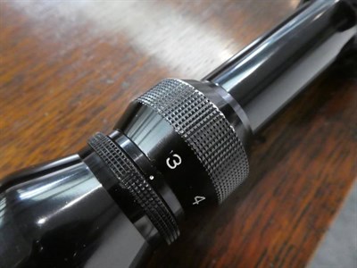 Lot 194 - A Yukon Optics Night Vision Riflescope, with manual and fitting bar, original box, together...