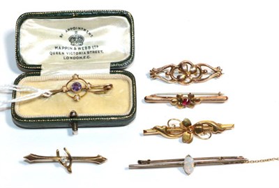 Lot 14 - An amethyst and seed pearl bar brooch, length 3.5cm in a fitted case marked Mappin & Webb;...