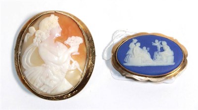 Lot 26 - A Victorian yellow metal mounted cameo brooch, measures 5.5cm by 4.75cm; and a Wedgwood...