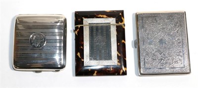 Lot 41 - A silver cigarette case, Birmingham 1917, with striped decoration and monogram; a Middle...