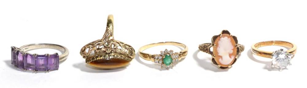 Lot 43 - A 9 carat gold tiger-eye ring, finger size M1/2; a 9 carat gold cameo ring, finger size L1/2; a...