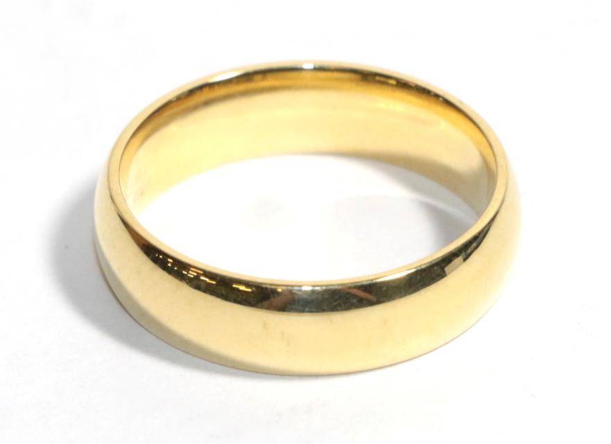 Lot 45 - An 18 carat gold band ring, finger size V