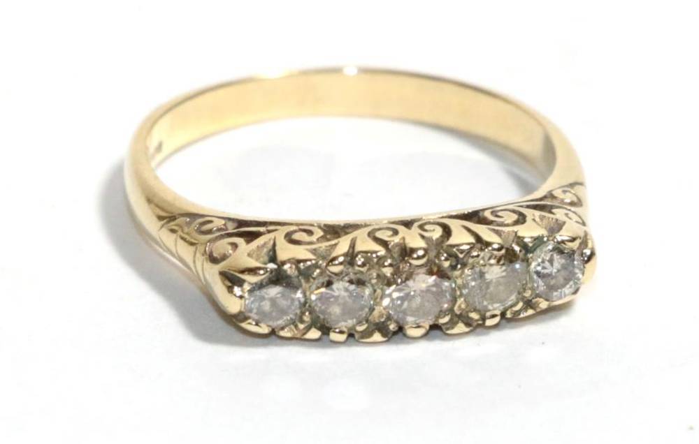 Lot 53 - A 9 carat gold five stone diamond ring, total estimated diamond weight 0.70 carat...