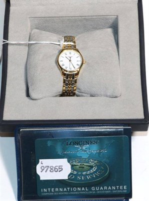 Lot 55 - A lady's bi-metal Longines wristwatch link bracelet, Roman dial with date aperture, plus...