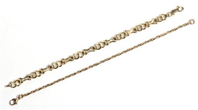 Lot 56 - Two 9 carat fancy link gold bracelets, both 19cm long (2)
