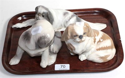 Lot 70 - Three Royal Copenhagen porcelain Pekinese dog ornaments
