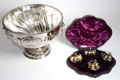 Lot 85 - A large silver plated pedestal punch bowl with lion mask drop ring handles; and a set of...