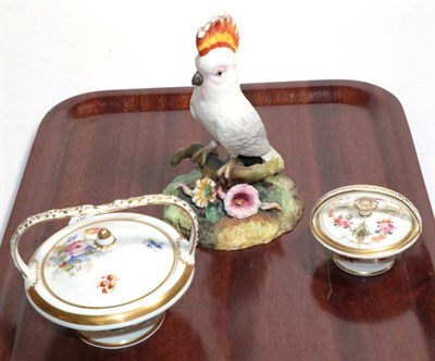 Lot 93 - Two small porcelain handled baskets, Royal Crown Derby cockatoo