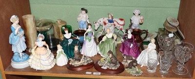 Lot 109 - A shelf of decorative ceramics and glass including a pair of bisque figures of hunters;...