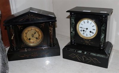 Lot 130 - Two Victorian striking black slate mantel clocks