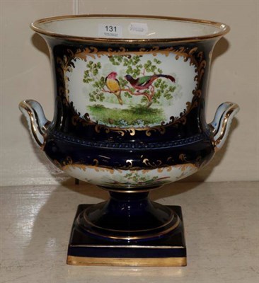 Lot 131 - A large twin-handled pottery campana form urn of Worcester style