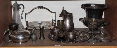 Lot 135 - A group of silver plated wares to include a Victorian teapot, a twin handled wine cooler etc...