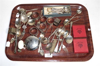 Lot 153 - A small group of miscellaneous silver including a seal top spoon, teaspoons, tea strainer,...