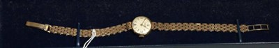 Lot 164 - A lady's 9 carat Favre-Leuba wristwatch, link bracelet, stamped, Arabic and baton circular...