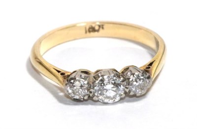 Lot 169 - A diamond three stone ring, stamped '18CT', finger size L