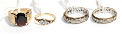 Lot 180 - A 9 carat gold gem set ring, finger size M; and three other rings, one stamped '375', finger...