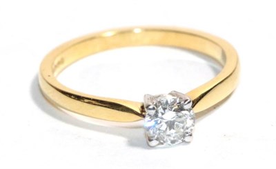 Lot 191 - An 18 carat gold solitaire diamond ring, a round brilliant cut diamond in a claw setting, to...