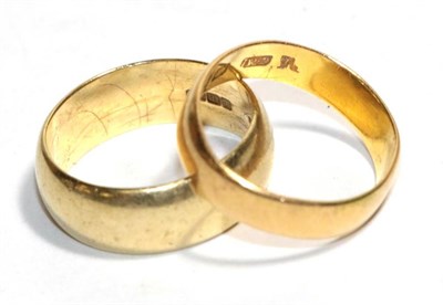 Lot 198 - A 22 carat gold band ring (misshapen) and an 18 carat gold band ring, finger size R1/2  (2)