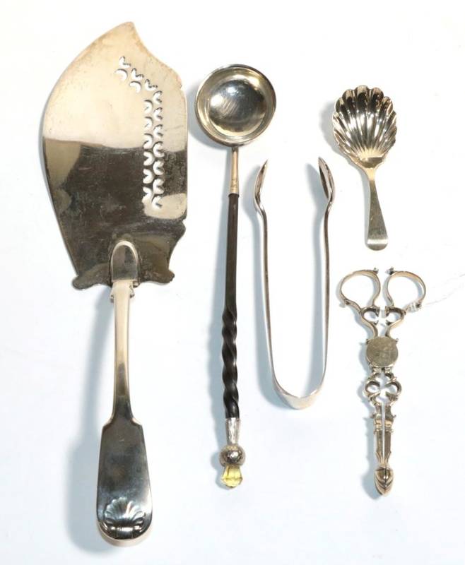 Lot 200 - A George IV provincial silver fish slice, Thomas Watson, Newcastle 1829; a Scottish toddy...