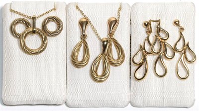 Lot 204 - Two 9 carat gold pendants on chains with matching earrings and one 9 carat gold pendant with...