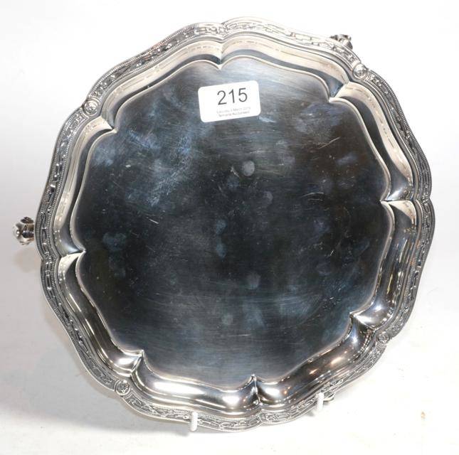 Lot 215 - A shaped circular silver salver, S Blanckensee & Son, Birmingham 1936, and Irish import marks...