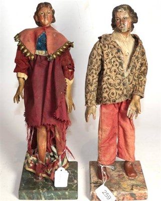 Lot 259 - A pair of carved polychromed wooden figures of Gentlemen, possibly Naples, 19th century, one...