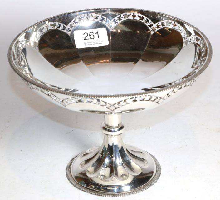 Lot 261 - A silver pedestal bowl, Fattorini & Sons, Sheffield 1923, with foliate pierced rim and fluted...