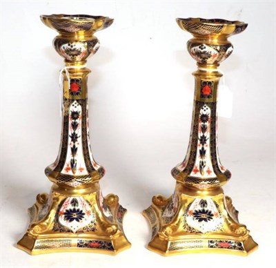 Lot 264 - A pair of Royal Crown Derby Imari pattern candlesticks, number 1128