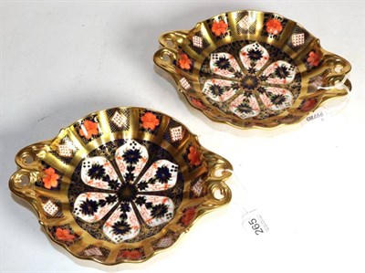 Lot 265 - A pair of Royal Crown Derby twin handled pedestal dishes
