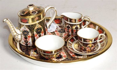 Lot 267 - A miniature Royal Crown Derby Imari pattern tea set, number 1128